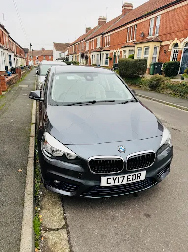 UDN Taxi Service car parked on a Yeovil street